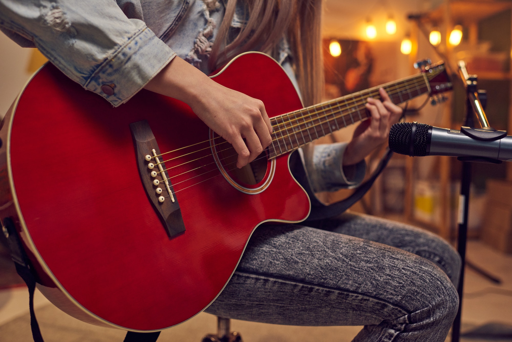 musician-playing-guitar-during-performance.jpg